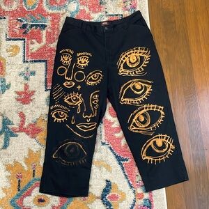 Hand painted bleach design trousers